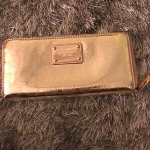 Gold monogrammed Michael Kors wallet